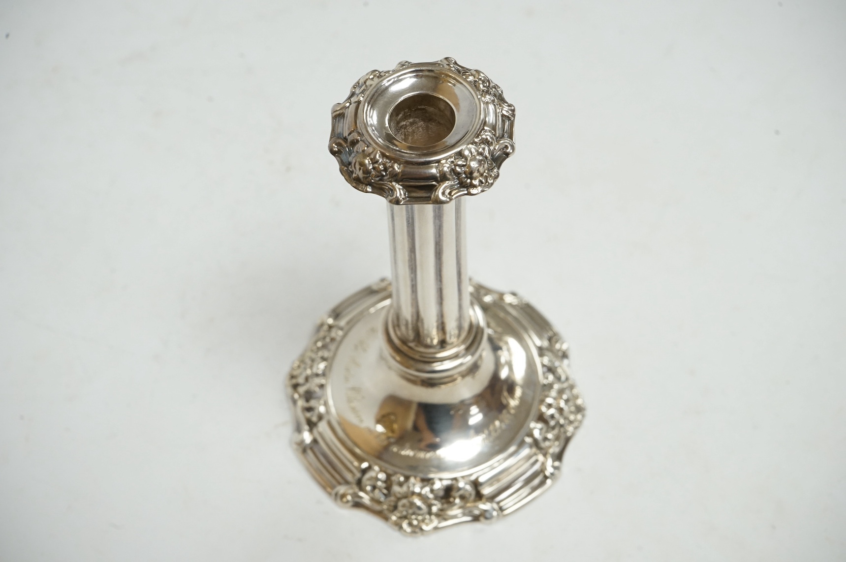 A Victorian silver cluster column dwarf candlestick by Henry Wilkinson & Co Ltd, Sheffield, 1847, 12cm, weighted, with later engraved inscription. Condition - fair